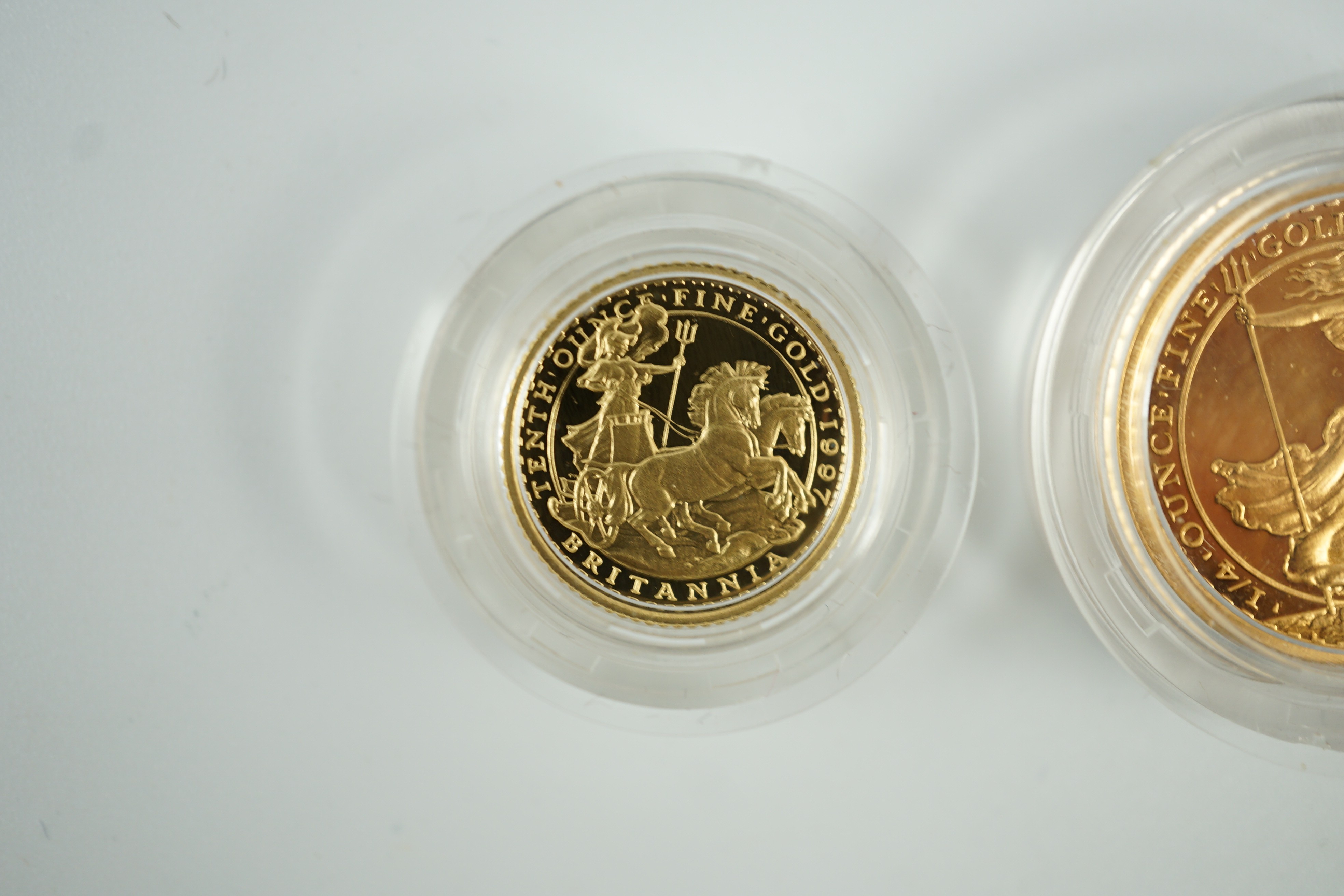 Elizabeth II (1952-2022), Royal mint gold proof Britannia £10, 1997 and gold proof Britannia quarter oz. £25, 1987, both cased